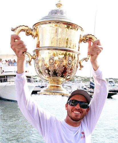 Taylor Canfield (USVI) Hoists the Gold Cup in celebration of his victory against Johnie Berntsson (SWE) 3-0 in the Argo Gold Cup 2012. © Charles Anderson/RBYC